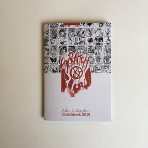 May include: A white sketchbook with a red and black illustration of the words "Scratch & Flow" and a grid of smaller black and white illustrations. The text "Alfie Gallagher Sketchbook 2019" is printed in black at the bottom.