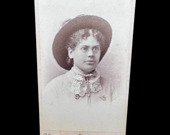 1880's CDV Carte De Visite of Woman with Spectacle and Hat .Clinedinst Baltimore MD frontmark