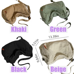 May include: Four canvas shoulder bags in different colors: khaki, green, black, and beige. The bags are all the same style, with a curved flap and a strap that goes over the shoulder. The bags are all about 13 inches long and 9 inches wide.