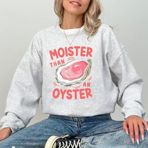 Moister Than An Oyster Sweatshirt, Retro Funny Graphic Tee, Unique Humor Sweatshirt, Cool Gift Idea, Trendy Casual Wear, Trending Now
