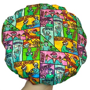 May include: A colorful surgical cap with a cartoon design featuring various medical specialties, including gynecology, neurology, orthopedics, and general surgery. The cap is made of a soft, breathable fabric and is perfect for keeping hair out of the way during surgery.