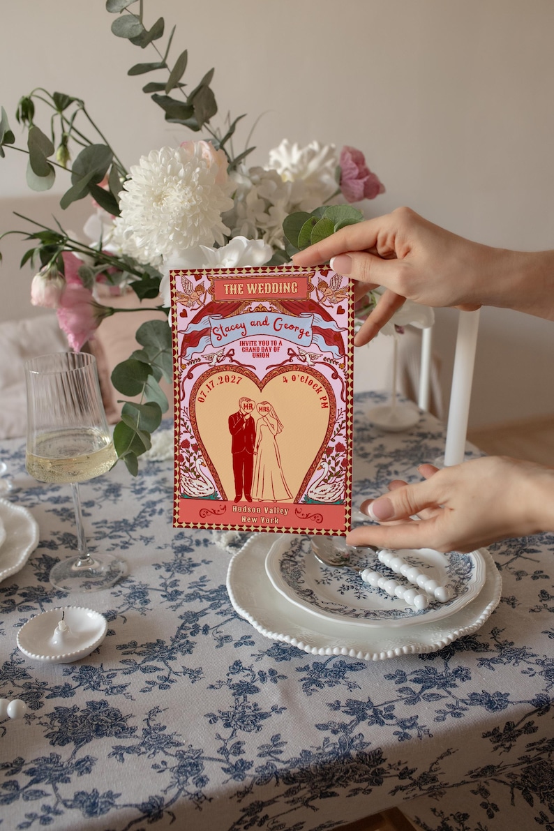Tunnel of Love inspired vintage circus wedding invitation suite mockup: 5x7 main invitation with bride, groom, swans, and heart-shaped archway design; 4x6 details card; 5x3.5 RSVP card in two variations with QR code option; red diamond harlequin pattern backs with S+G heart monogram; bonus 10.5x2 belly band. Whimsical retro carnival-style editable printable wedding stationery template set by Krist Lunaire Co.