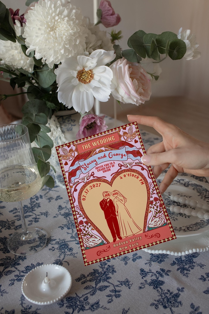 Tunnel of Love inspired vintage circus wedding invitation suite mockup: 5x7 main invitation with bride, groom, swans, and heart-shaped archway design; 4x6 details card; 5x3.5 RSVP card in two variations with QR code option; red diamond harlequin pattern backs with S+G heart monogram; bonus 10.5x2 belly band. Whimsical retro carnival-style editable printable wedding stationery template set by Krist Lunaire Co.