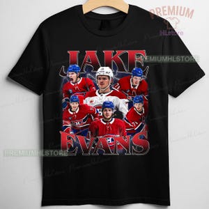 May include: Black t-shirt with a graphic of Jake Evans, a hockey player, and the text "JAKE EVANS" in red and white. The design includes images of the player in his hockey uniform.
