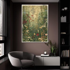 May include: A framed floral print featuring a vibrant meadow scene with a variety of wildflowers in shades of red, yellow, and white. The artwork is set against a golden background, creating a warm and inviting aesthetic. The print is displayed in a modern living room setting.