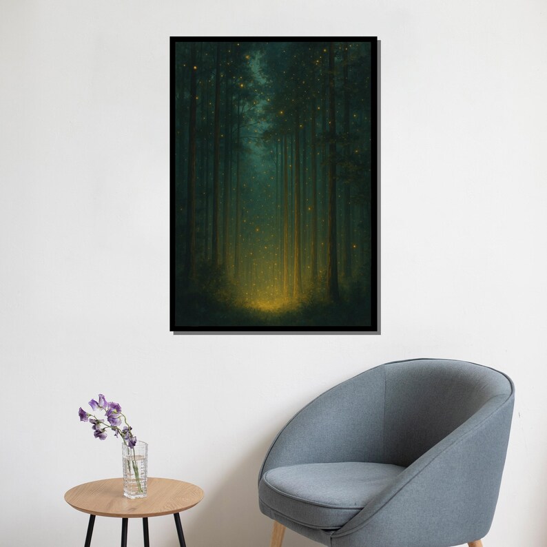 May include: A framed art print depicting a forest scene with tall, dark green trees. The artwork features a glowing, golden light at the base of the trees, creating a mystical atmosphere. The frame is black.