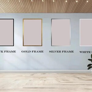 May include: Four framed art pieces with different frame styles: black, gold, silver, and white. Each frame surrounds a light pink rectangular image. The text below each frame indicates the frame color. A potted plant is in the corner.