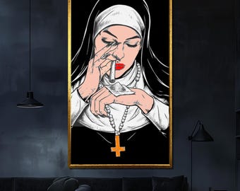 May include: A framed art print featuring a stylized illustration of a nun. The nun is depicted with red lipstick, smoking a cigarette, and wearing a habit and a rosary with a cross pendant. The artwork has a black background and a gold frame.