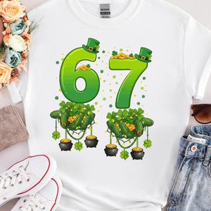6 7 Meme St Patrick’s Day Shirt, Funny Irish Shamrock 6 7 Tee, Leprechaun Gold Pot Celebration, Unisex Birthday T-Shirt