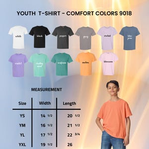May include: A display of youth t-shirts in various colors, including white, black, and grey. The image also shows a measurement chart with sizes ranging from YS to YXL, with widths from 14 1/2 to 19 1/2 inches and lengths from 20 1/2 to 26 inches.