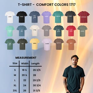 May include: A display of Comfort Colors 1717 T-shirts in various colors, including white, black, blue jean, and violet. The image also shows a measurement chart with sizes ranging from S to 2XL, with width measurements from 18 1/8 inches to 26 inches and lengths from 26 3/5 inches to 31 3/5 inches.