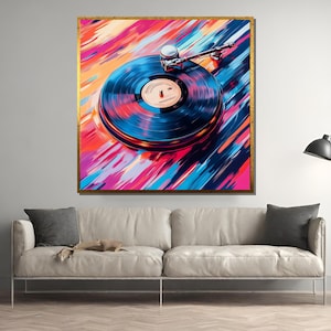 May include: A colourful abstract painting of a record player with a black vinyl record on the turntable. The background is a vibrant mix of pink, blue and yellow.