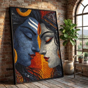 Puede incluir: Obra de arte enmarcada que representa dos rostros de perfil, tocándose las narices. Un rostro es azul con marcas blancas, el otro es gris. El fondo está dividido por tonos naranja y amarillo. La obra está en un marco negro y se apoya en una pared de ladrillo.