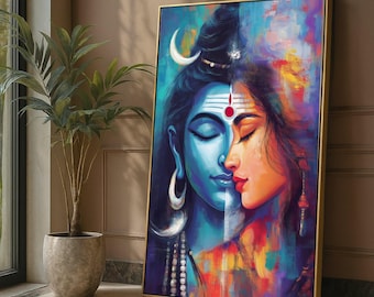 May include: A framed canvas art print depicting a split portrait of two figures. One side is blue with a crescent moon, the other side is orange and red. The artwork has a gold frame and is leaning against a wall.