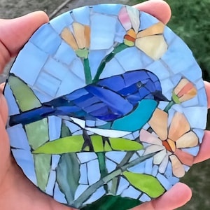 Decorative wall mosaic with blue bird