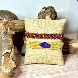 Macrame set bracelet with tiny hearts and beads.