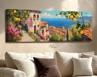 May include: A panoramic canvas wall art print depicting a coastal Mediterranean village with terracotta roofs, stone pathways, and vibrant pink flowers. Bright yellow lemons hang from branches in the foreground, overlooking a deep blue sea.