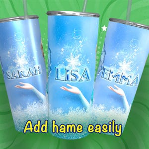May include: Three stainless steel tumblers with a Frozen theme. The tumblers are blue with a snowflake design and the names "Sarah", "Lisa", and "Emma" are printed on them. The text "Add name easily" is printed below the tumblers.