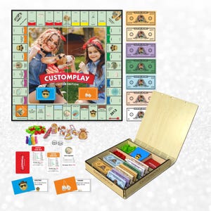 May include: A custom board game set featuring a square game board with a central photo of two people and a dog, colorful play money, small plastic game pieces, dice, and cards. The set includes a wooden storage box with internal compartments.