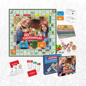 May include: A Customplay board game set featuring a square game board with a central photo of two people and a dog, stacks of play money, game cards labeled Adulting and Chance, small character tokens, two dice, and a blue game box with a matching photo.