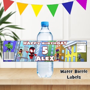 May include: Water bottle label featuring a colorful cartoon city scene with superheroes. The label says "Happy Birthday 5 Alex" and includes a barcode.