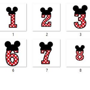 Puede incluir: Diez im&aacute;genes de n&uacute;meros con tem&aacute;tica de Mickey Mouse, cada uno con un patr&oacute;n de lunares rojos y blancos y orejas negras. Los n&uacute;meros son del 0 al 9.
