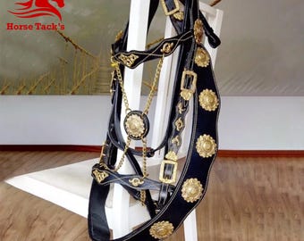 Baroque custom horse bridle in cowhide leather with elegant gold detailing, handmade tack with gold ornamental pieces