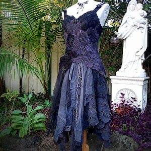 black tattered dress Black Coffee Stretch Knit Tattered Front Criss Cross Eyelet Webbing Embellished Punk Style Suspender Dress