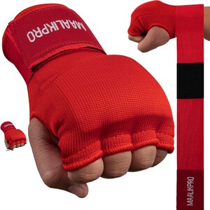 The MaalikPro Boxing Inner Red Gloves are built from 70% cotton and 30% elastic — the stretch lets the glove conform to your hand shape naturally while the cotton keeps it breathable through long sessions. The foam and gel padding sits directly over your knuckles right where the impact lands. Two materials working together — gel absorbs the initial shock, foam distributes it across a wider area so nothing concentrates on one spot during heavy bag work or pad rounds.