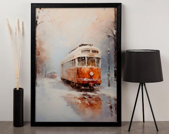 Op de afbeelding: Ingelijste aquarel van een vintage oranje en witte tram op rails in een besneeuwde scène. Het kunstwerk zit in een zwarte lijst en toont een winterlandschap met een tweede tram op de achtergrond.
