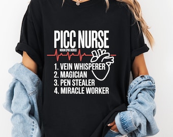 おもしろPICC看護師静脈ささやき魔術師ペン泥棒奇跡の働き手Tシャツ、PICCライン看護師ギフト、IV療法グラフィックTシャツ