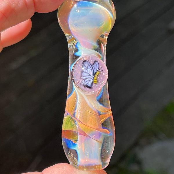 Blown Glass Pipe with butterfly murrini. Pyrex. It measures 2 3/4” long and comes in a drawstring gift bag. Read age restrictions!