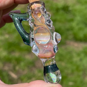 May include: A set of three ceramic mugs with a speckled, matte finish. The mugs are in shades of cream, light gray, and dark gray. Each mug has a simple, minimalist design, perfect for coffee or tea.