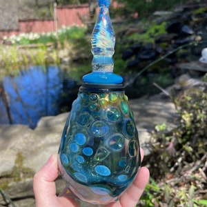 Blown Glass, Handmade Pyrex Jar, with glass lid, tons of tiny opals and a hidden Om symbol inside! It seals tightly with a rubber grommet.