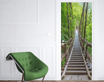 May include: A wooden staircase leading up a rope bridge through a lush green forest. The bridge is made of thick ropes and wooden planks. The forest is dense with trees and foliage.