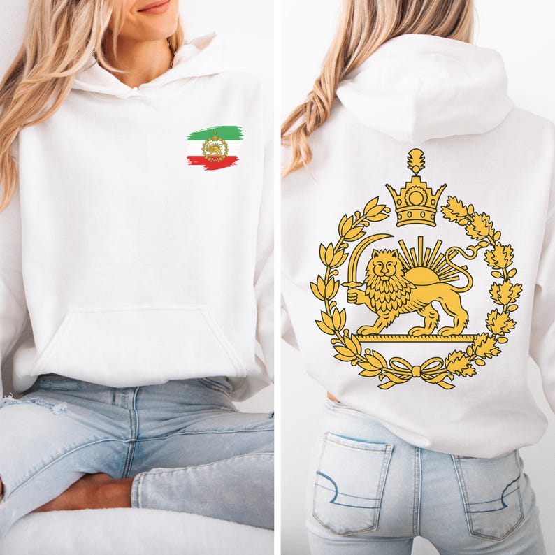 May include: White hoodie with a front pocket and a hood. The front features a small Iranian flag design. The back displays a gold emblem of a lion holding a sword, surrounded by a wreath and a crown. The hoodie is made of a soft material.