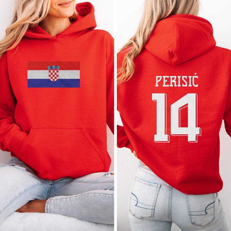 A woman wearing a red hoodie with the Croatia national flag and the number 14 on the back.