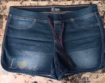 Women Shorts Size XL 15-17 Mid-Rise with Lazer engraved "Love" on the front.