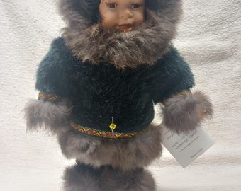 Genuine porcelain native Eskimo doll