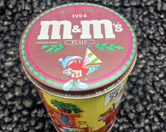 Vintage M&M Christmas holiday collectible tin featuring Santa Claus on Christmas Eve