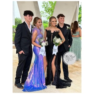 May include: Two individuals in formal attire stand with two others. One wears a floor-length iridescent purple sequined gown with feather accents. The other wears a black floor-length gown with lace detailing and a high slit. Both hold bouquets with ribbons labeled SHS 2024.