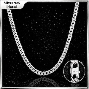 May include: A silver-plated curb chain necklace with interlocking links. The text Silver 925 Plated is visible in the top left corner. A circular inset shows the clasp mechanism with the engraved text S925 on the metal surface.