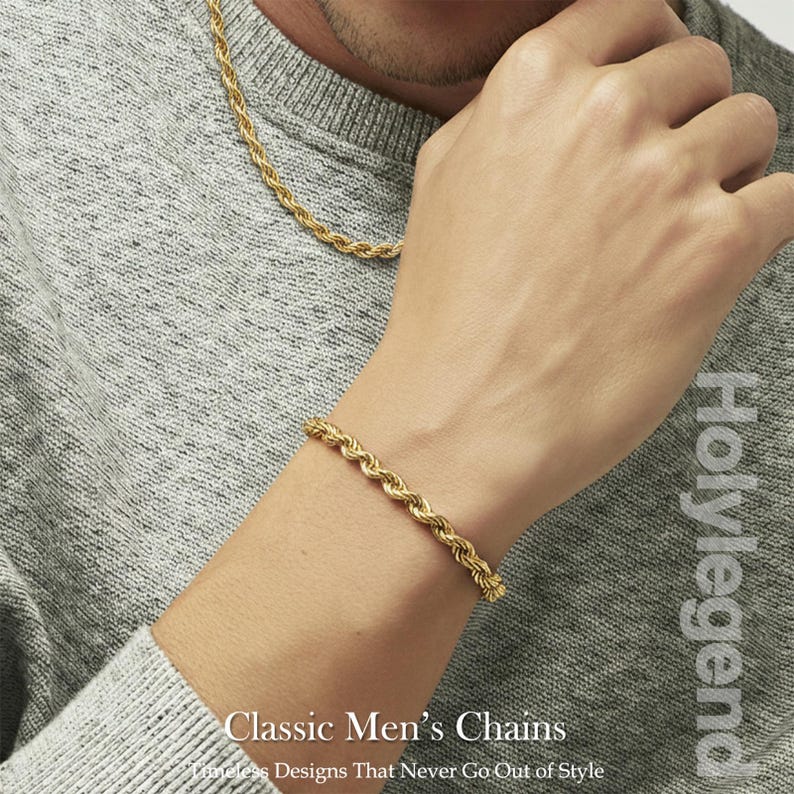 May include: A gold-colored rope chain necklace and bracelet. The jewelry is displayed on a person wearing a gray sweater. The image includes the text "Classic Men's Chains" and "Holy Legend".