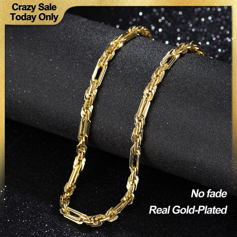 May include: A gold-plated necklace with a rectangular link design. The chain is displayed on a black surface. The image includes the text "Crazy Sale Today Only", "No fade", and "Real Gold-Plated".