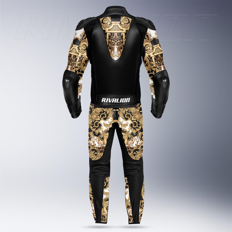 May include: Black and gold motorcycle racing suit with decorative patterns. The suit has a black leather upper body and legs, with gold and white baroque-style designs on the sleeves and lower legs. The text "RIVALION" is printed on the back.