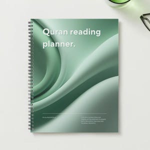 May include: A green spiral bound notebook with the text "Quran reading planner." The cover features a green abstract design with a white background.