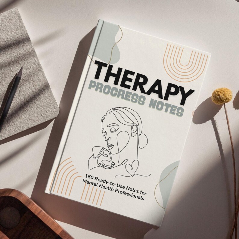May include: A white Therapy Progress Notes journal with the title in large black letters and the subtitle in grey. The cover features a line drawing of a person with a dog and the text "150 Ready-to-Use Notes for Mental Health Professionals."