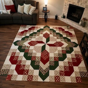 May include: A large rectangular quilt featuring a geometric star pattern composed of cream, forest green, and deep red fabric squares. The design incorporates solid colors alongside intricate floral and small-scale patterned prints throughout.