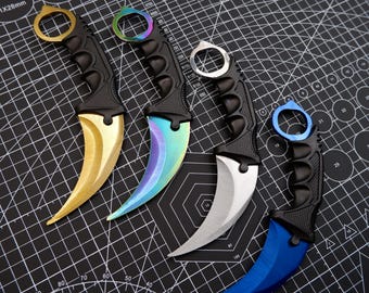 Cuchillo de juguete tipo garra Karamabit de Game Periphera, ideal para entrenamiento al aire libre. Modelo sin filo, ideal como adorno o regalo para niño.