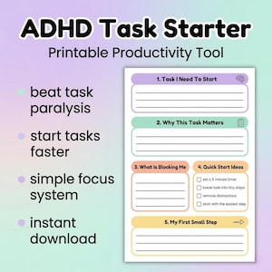 May include: A white ceramic mug with a black handle and the text "But First, Coffee" in a black, handwritten-style font. The mug is on a white surface.